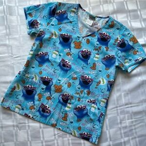 Sesame Street Cookie Monster Print 3 Pocket Short Sleeve Scrub Top